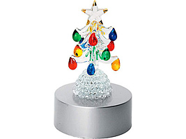 Новогодняя ёлка с разноцветными украшениями на подставке с меняющей цвет подсветкой